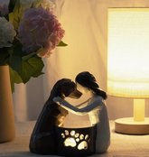 Contemporary Resin Dog and Girl LED Light Figurine